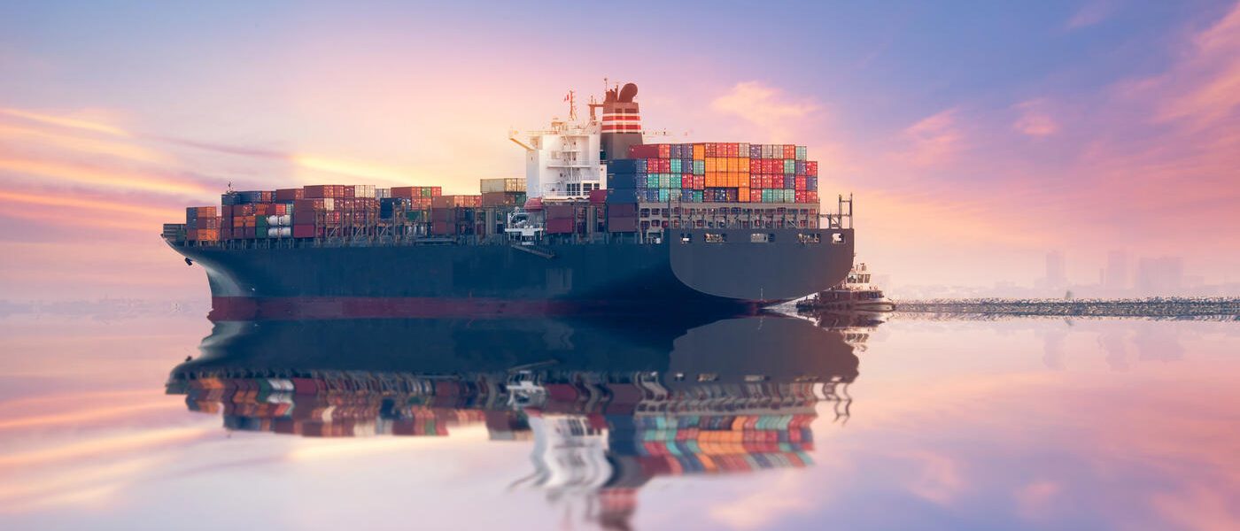 Industrial Container Cargo freight shipping by crane Logistic Import Export in shipyard at sunset time